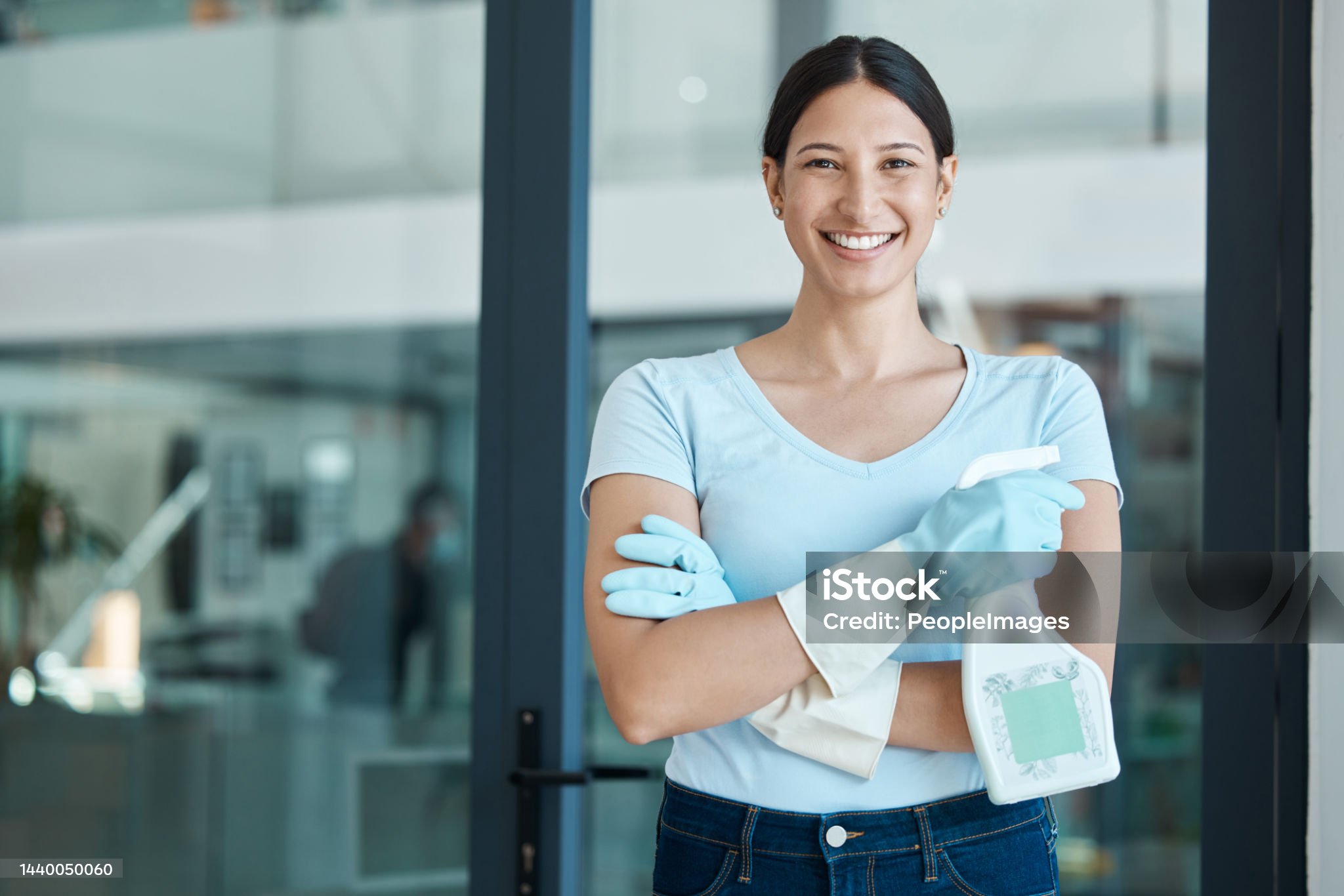 Friendly cleaning staff with a smile